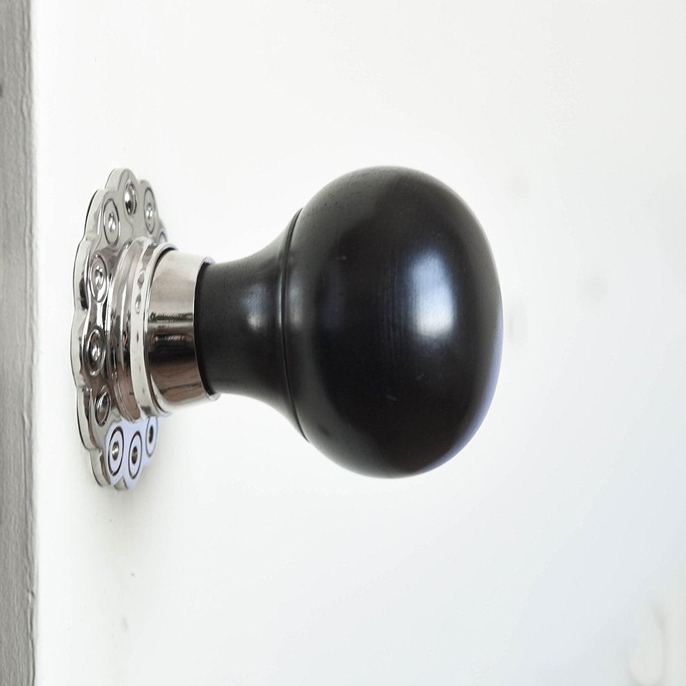Solid ebony and nickel bun door knob side view