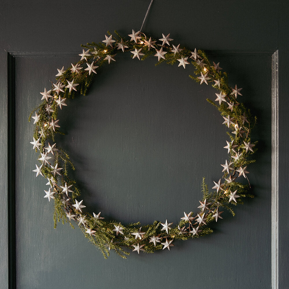 Star wreath with natural foliage intertwined