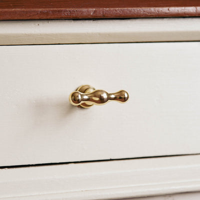 Brass T Bar Drawer Pull on unit seen from front