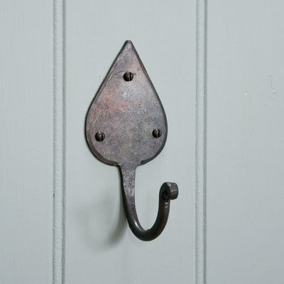 A gothic style hook showing the wrought iron black beeswax finish