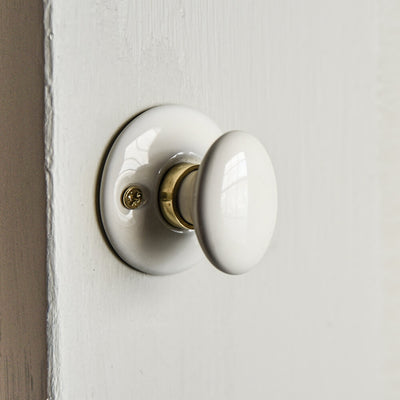 White ceramic thumbturn oval knob