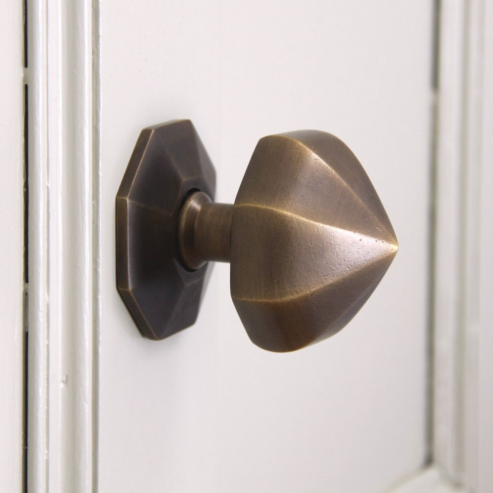 Side view of 3 inch Pointed Octagonal Door Pull in Distressed Antique Brass.