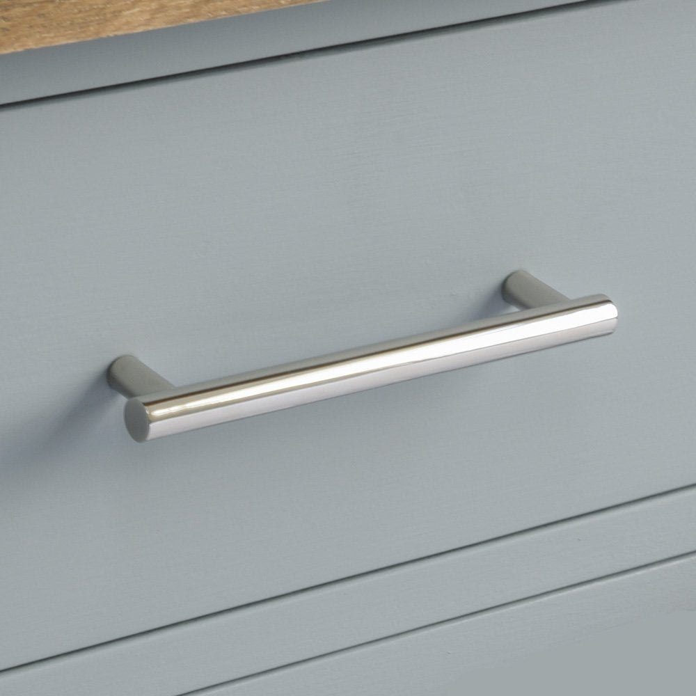 Drum Pull Handle in polished nickel on drawer.