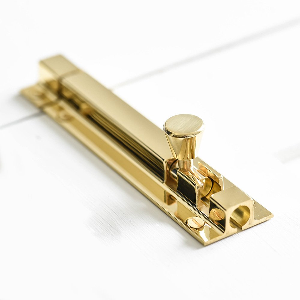 Close up of Square Section Barrel Bolt in Polished Brass.