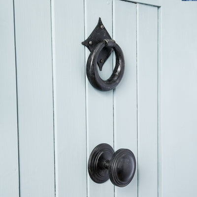 A Berkeley Door Pull fitted with a matching ring door knocker