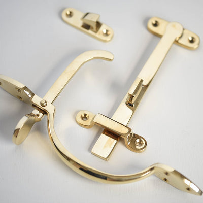 Components of Suffolk Latch in Polished Brass.
