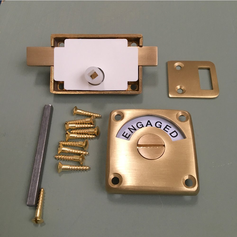 Components of Vacant Engaged Lock in Satin Brass.