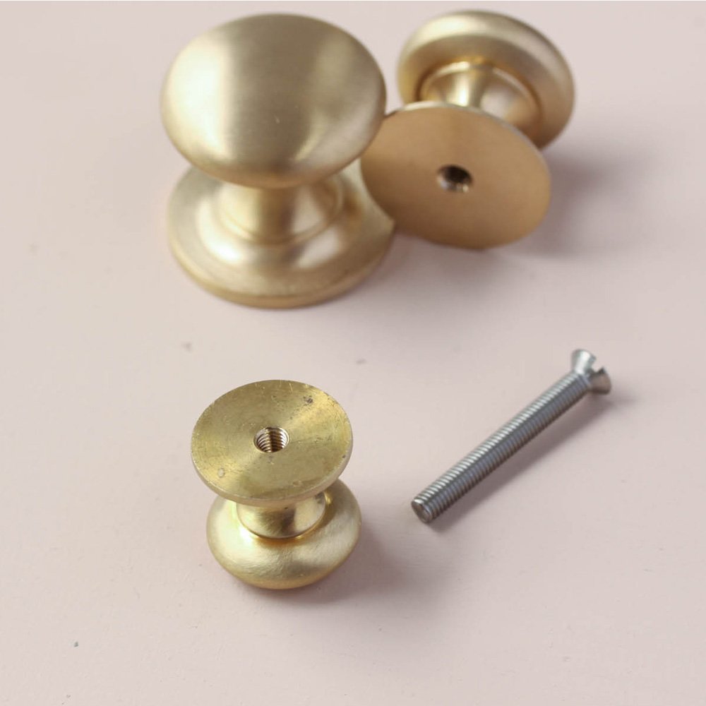 Components of Satin Brass Cabinet Knobs.