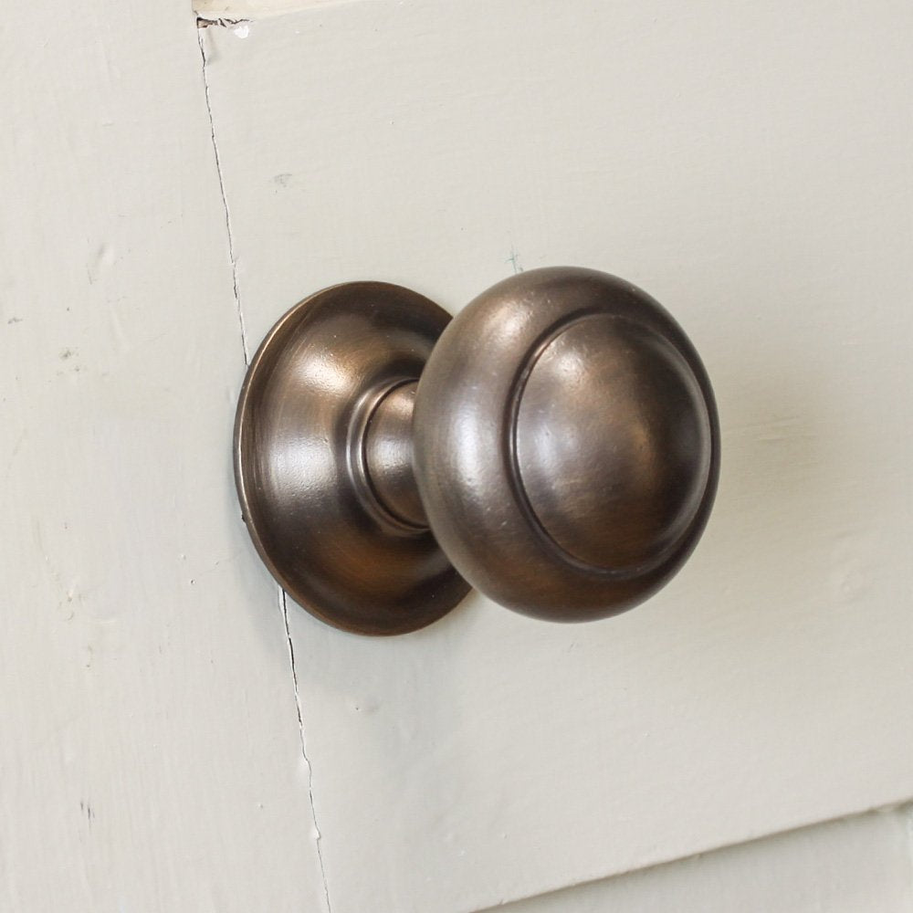 Alternate angle of solid brass Round 3 inch Door Pull in Distressed Antique finish.