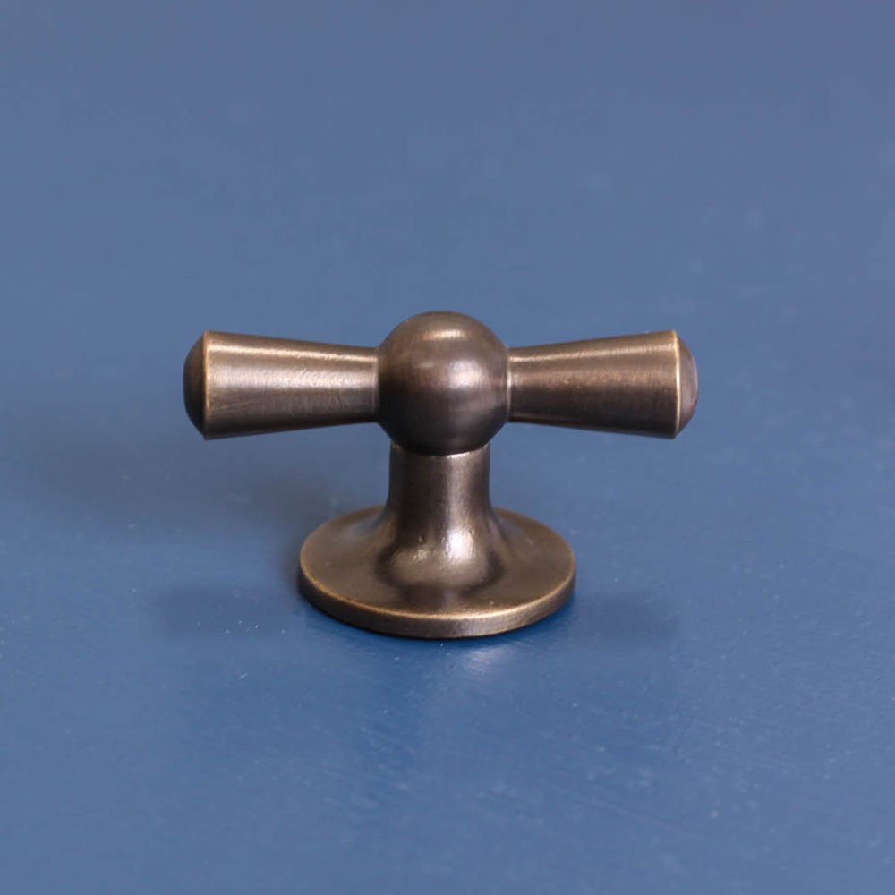 Crossed T Shaped Cabinet Knob in Distressed Antique Brass