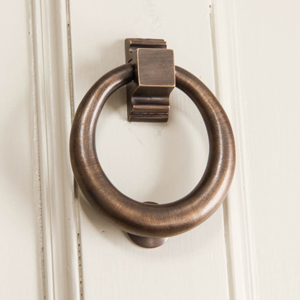 Distressed Antique Brass Hoop Door Knocker on Door