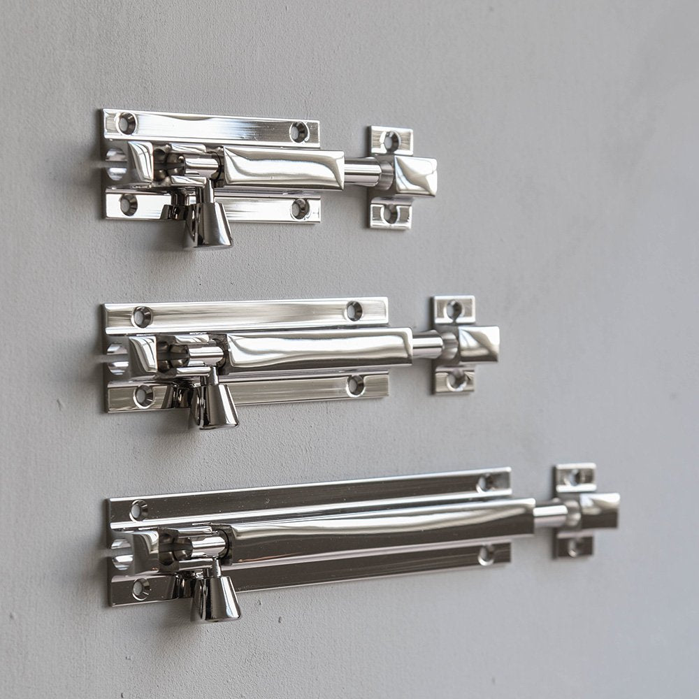 Square Section Barrel Bolts in Polished Nickel in three sizes ascending from the top.
