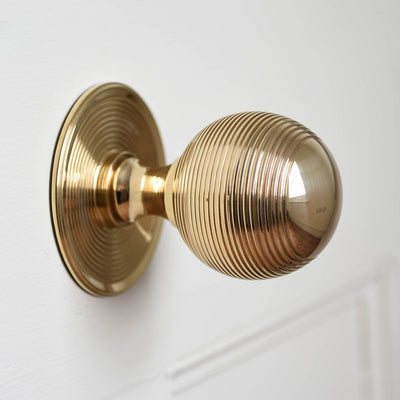 Solid polished brass Large Beehive Door Pull.