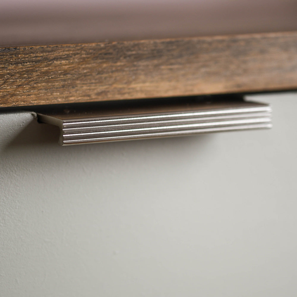 Solid brass Reeded Cabinet Edge Pull in Satin Nickel finish on drawer.