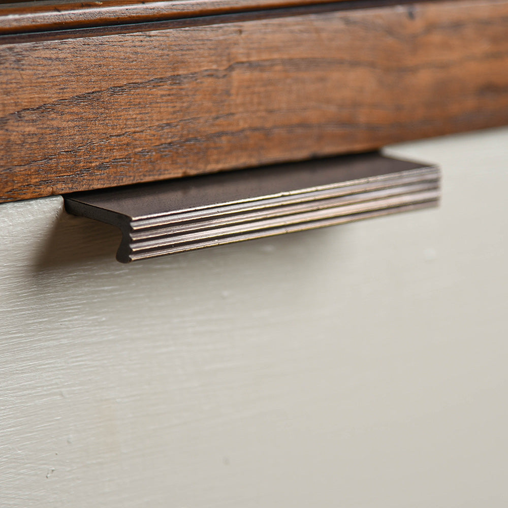 Solid brass Reeded Cabinet Edge Pull in distressed antique finish.