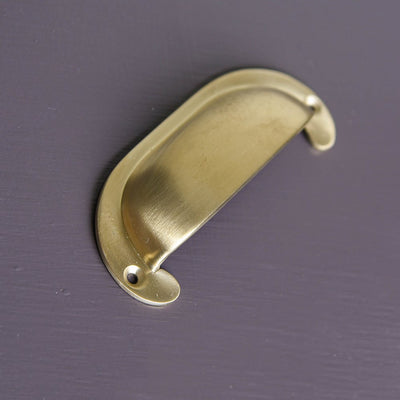 Alternate angle of solid brass Large Curved Hooded Pull with brushed finish.