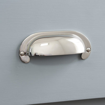 Large Curved Hooded Pull in polished nickel finish.