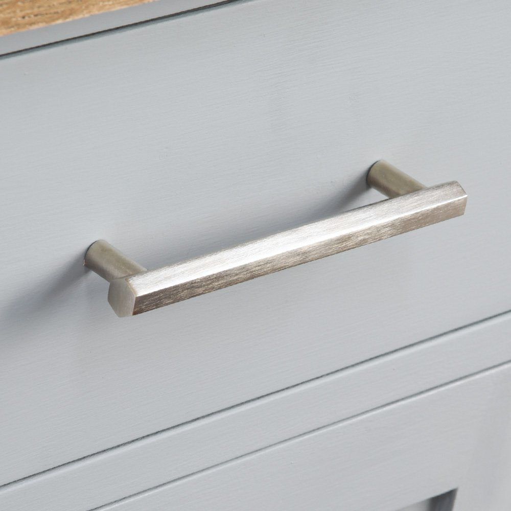 Satin nickel Hex Pull Handle on cupboard drawer.