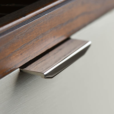Angled view of Tapered Cabinet Edge Pull in Polished Nickel.