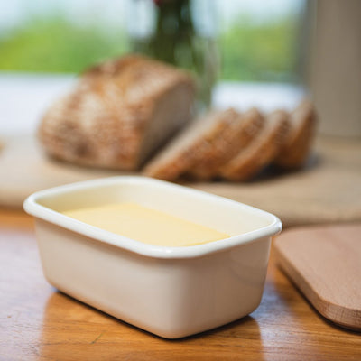 White enamel butter dish with butter