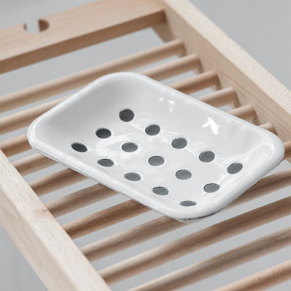 White enamel soap dish with drainage holes and base