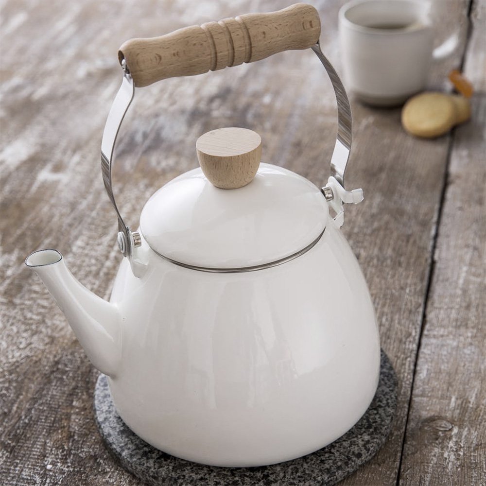Warm white enamel stove top kettle with wooden handle
