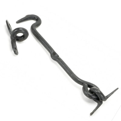 A forged black beeswax Cabin hook with a hook keep