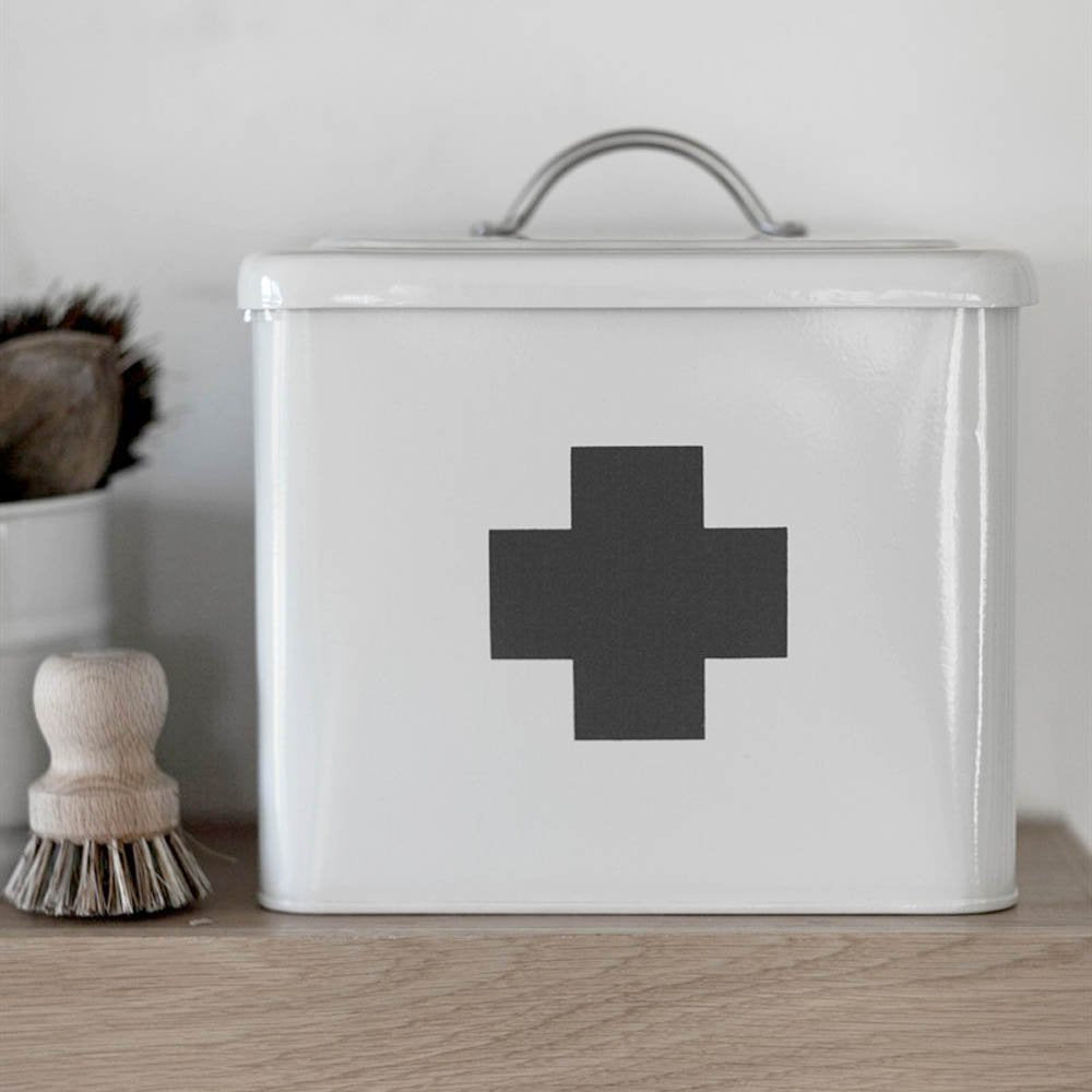 Chalk white first aid tin with lid and cross symbol on front