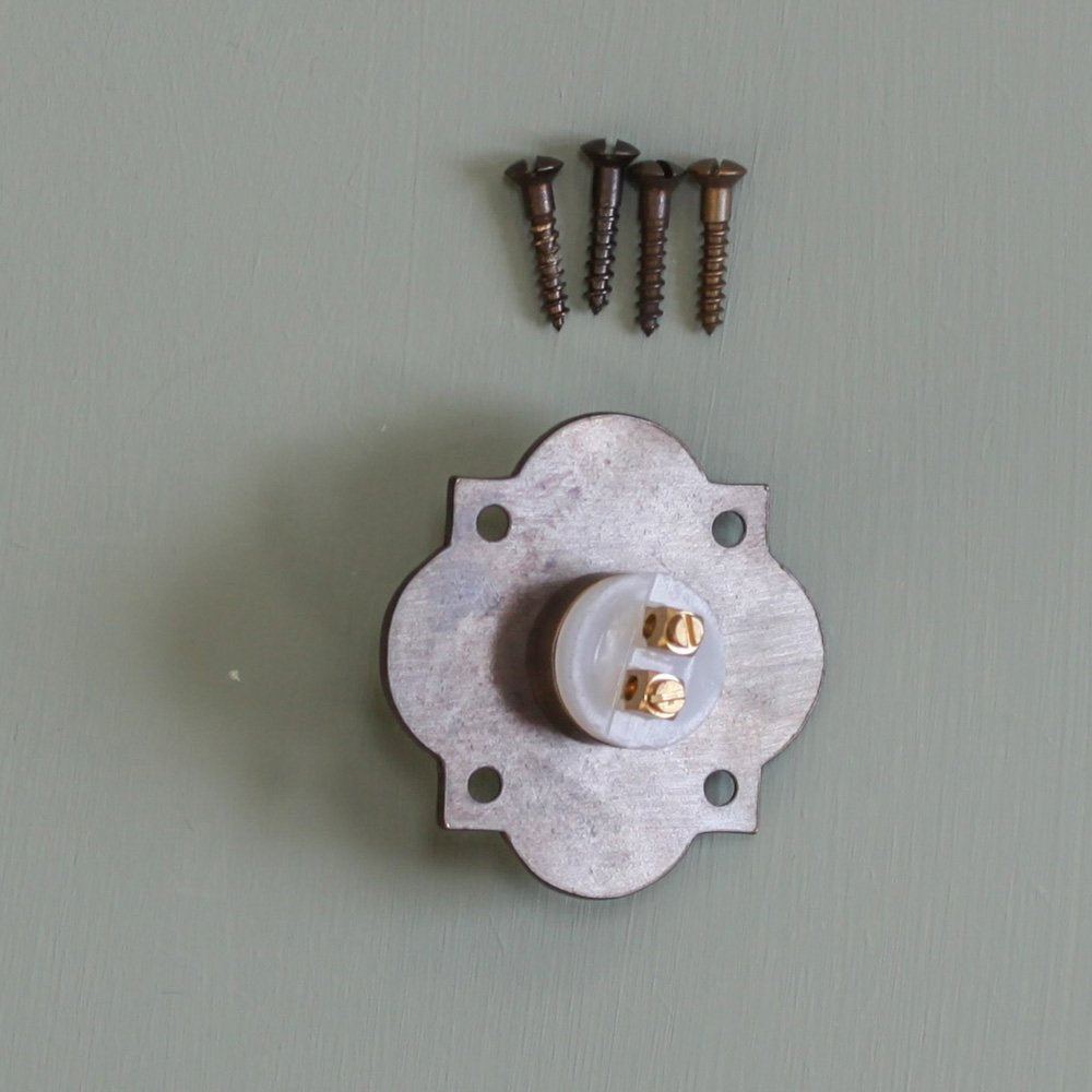 Components of Quatrefoil Bell Push in Distressed Antique Brass.