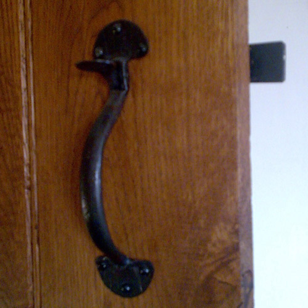 A Suffolk Thumb Latch fitted to a door