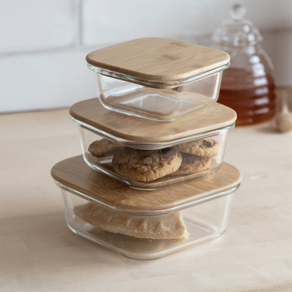 Stack of three glass storage containers with bamboo lid