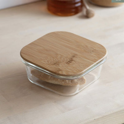 Closed glass storage container with food item inside