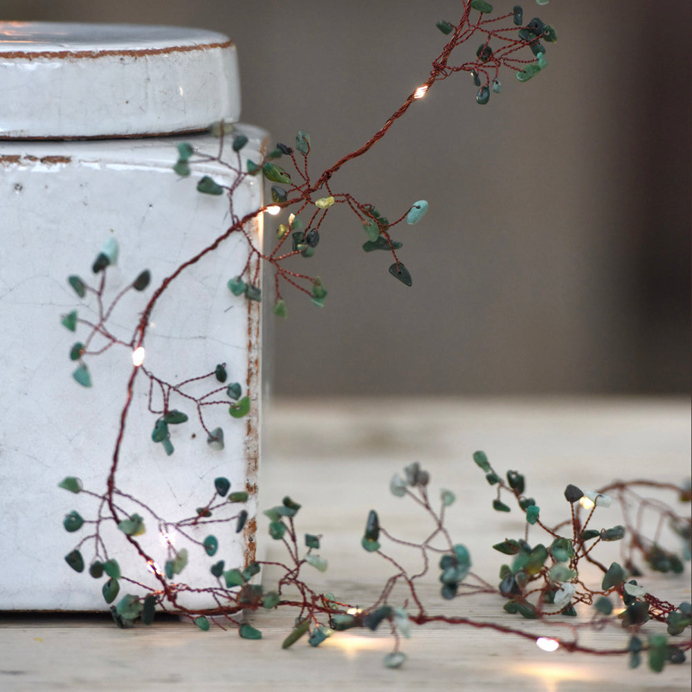 Copper wire fairy lights with LEDs and green gemstones
