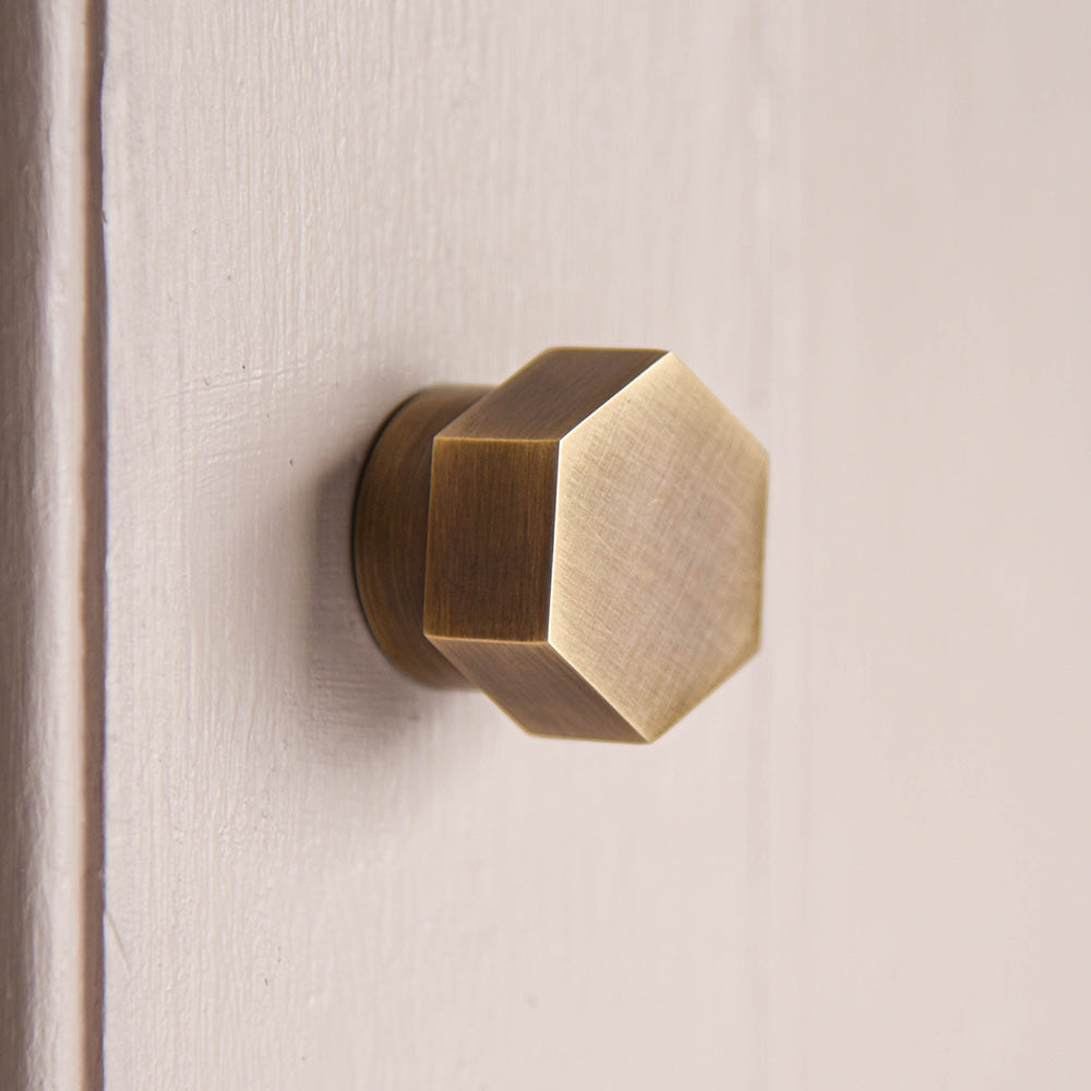 Solid brass Hex Cabinet Knob with light antique finish.