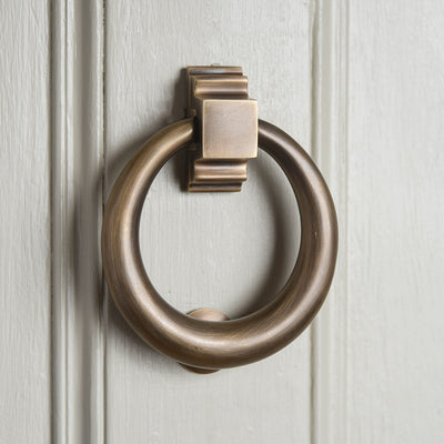 Solid brass Hoop Door Knocker with light antique finish.