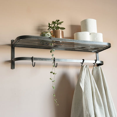 Steel shelf with rounded edges and hook rail below