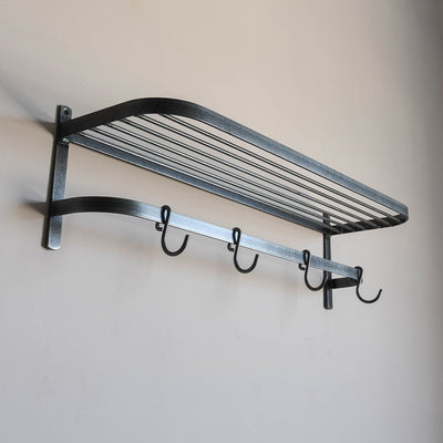 Steel rack with rounded edges and hook rail below