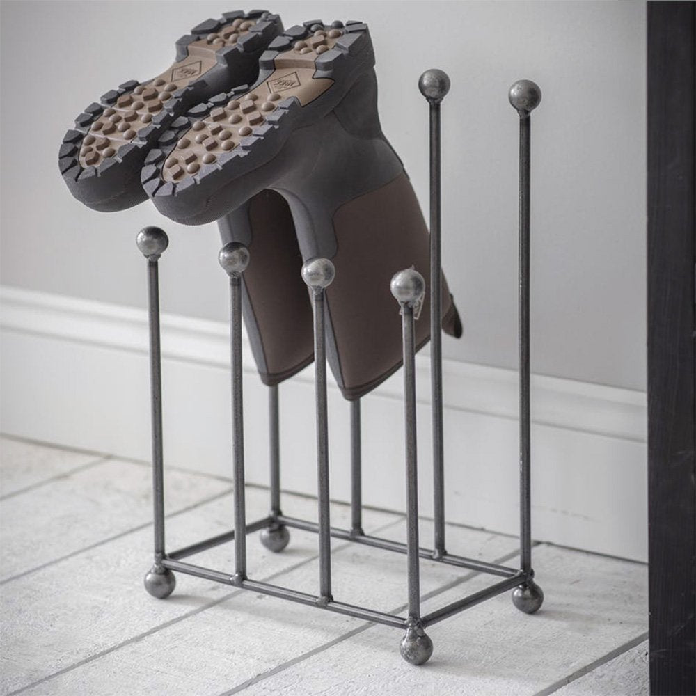 Industrial style wellington boot stand with ball finials and display wellies