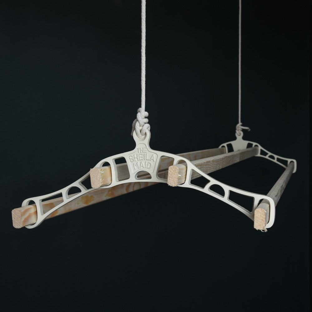 Hanging clothes airer with ivory ends