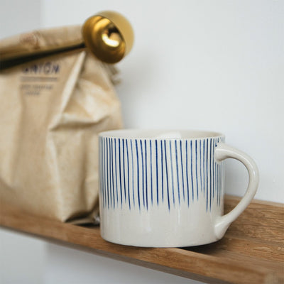 Short Karuma White & Blue Lined Ceramic Mug on Shelf
