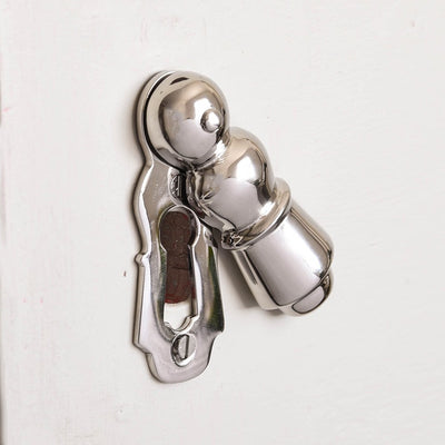 Solid brass Greenbank Escutcheon with polished nickel finish over door keyhole