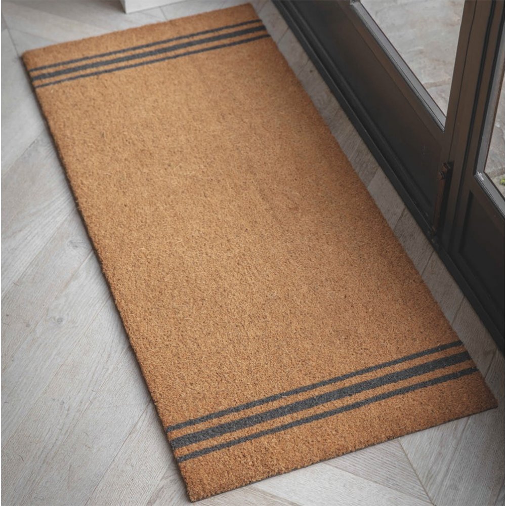Large tan brown coir doormat with three thin charcoal stripes at each end