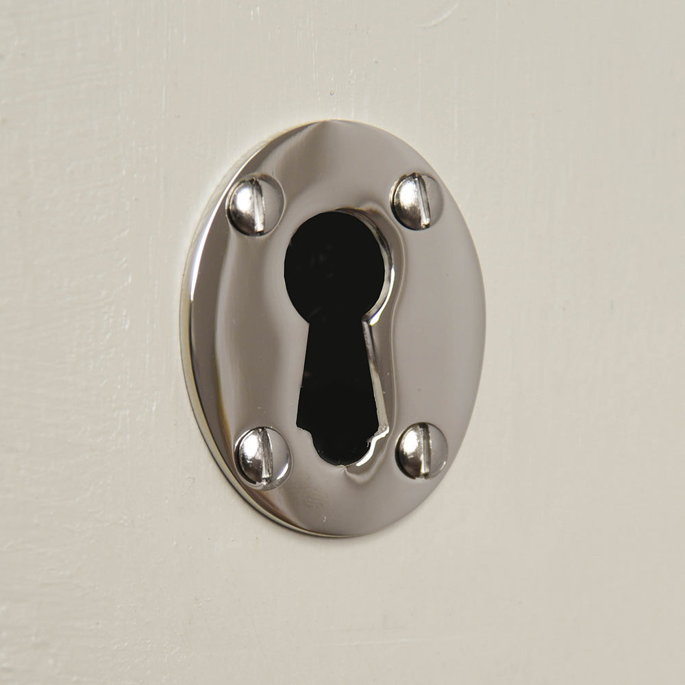Large Oval Keyhole Escutcheon in Polished Nickel on Door