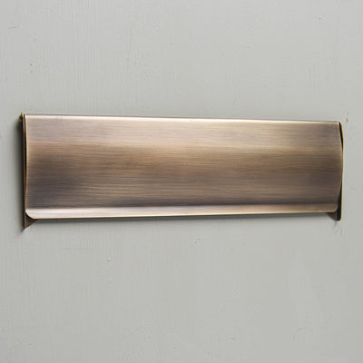 Solid pressed brass Internal Letter Tidy in light antique finish.