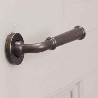 Alternative angle of Solid brass pair of Grace Lever Handles in distressed antique brass finish.