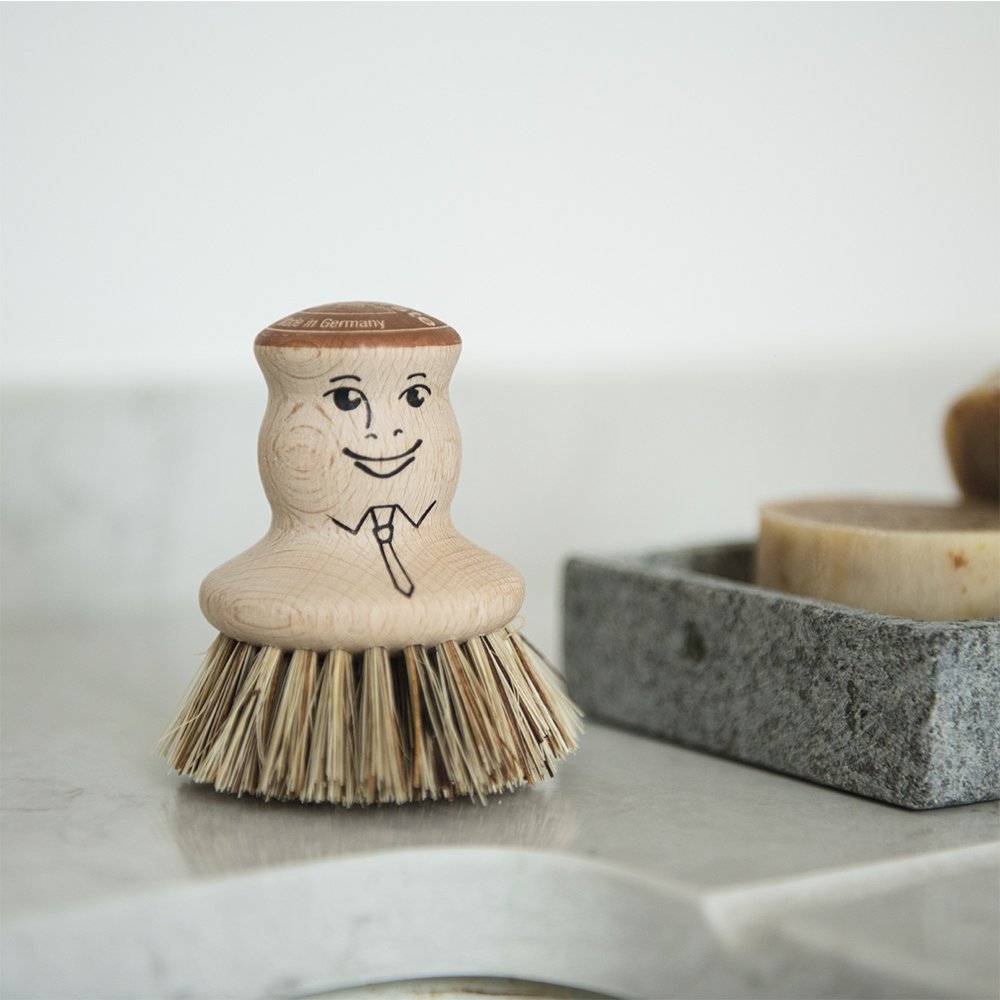 Wooden dish washing brush with friendly face and strong bristles