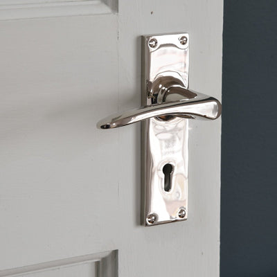 Oaken Lever Handles with Rectangular Backplate in Polished Nickel