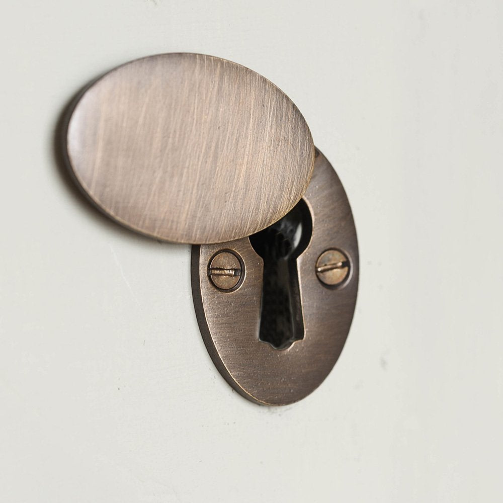Open Oval Covered Escutcheon in Distressed Antique Brass