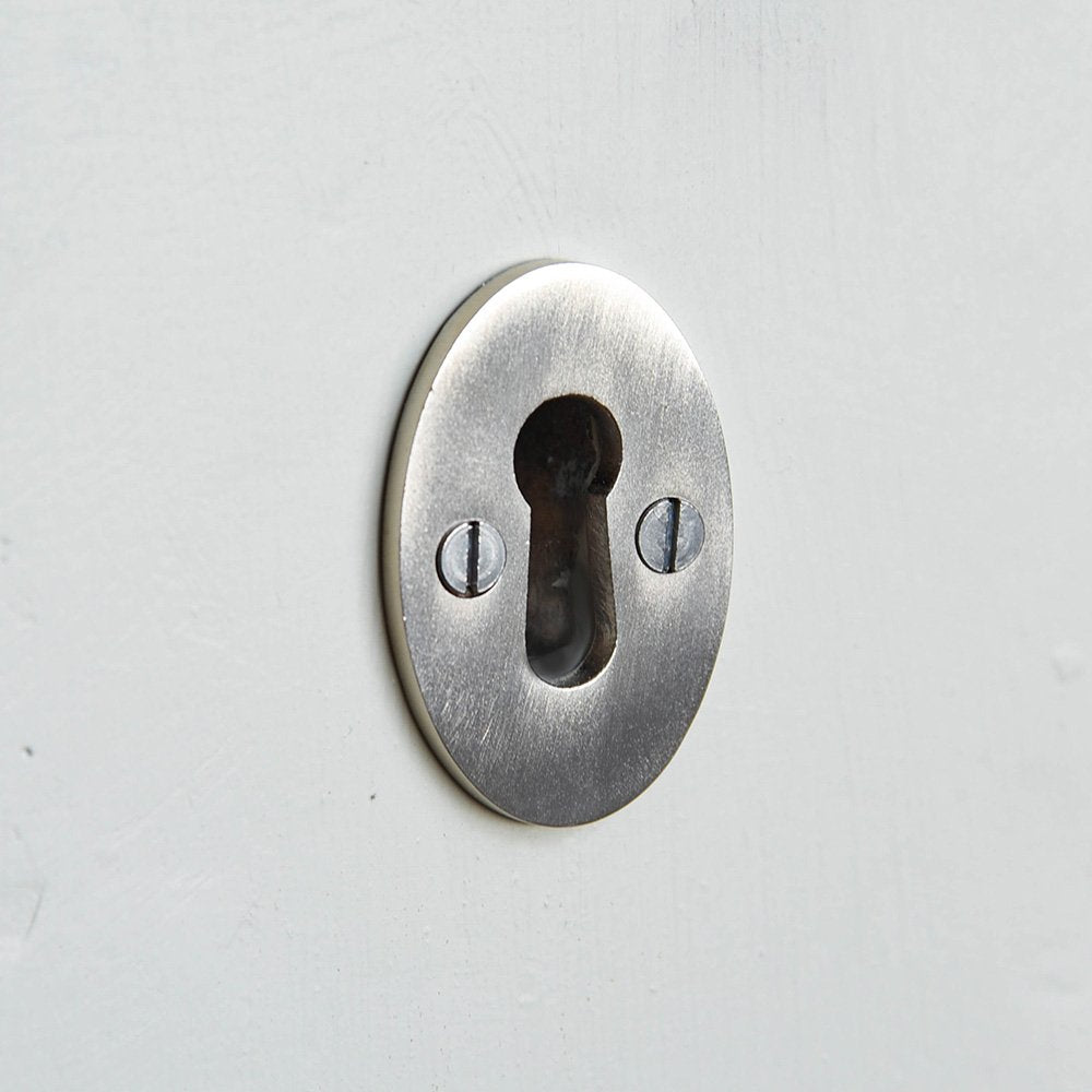 Solid brass Plain Oval Escutcheon Without Cover in Satin Nickel plated finish.