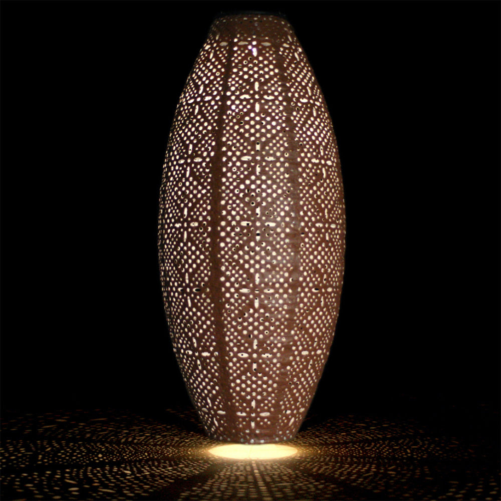 Brown Oval Shaped Solar Lantern Light at Night Time